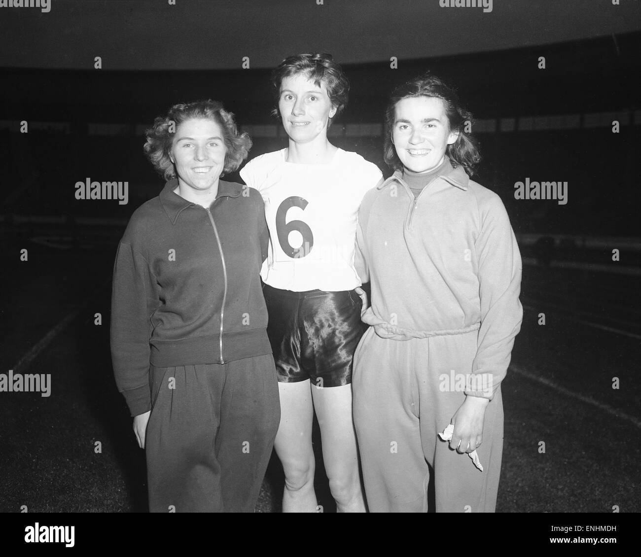Left to right Betty Loakes, Nora Smalley and Diane Leather after 880 yard Womens Relay Race at White City during the Daily Mirror Cavalcade of Sport event 27th May 1957 Stock Photo