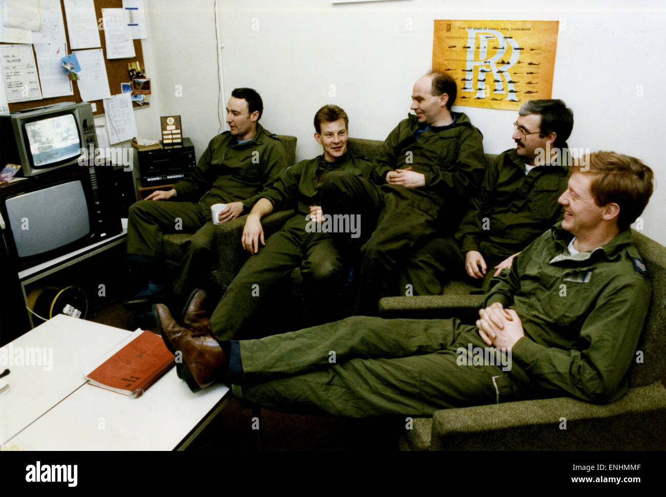 Ground crew relax in their crew room at RAF Leuchars, January 1992. left to right: Corporal Tony Grane, Corporal Paul Blevins, Corporal John Tennick, Sergeant Brian Robertsoon, Sergeant Steve West. Stock Photo