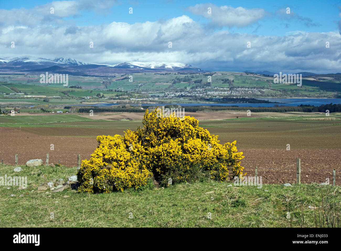 View towards Highland town Dingwall in Scotland with Scottish mountain