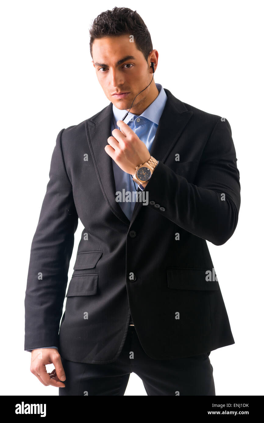 Elegant man ressed as bodyguard or security agent Stock Photo