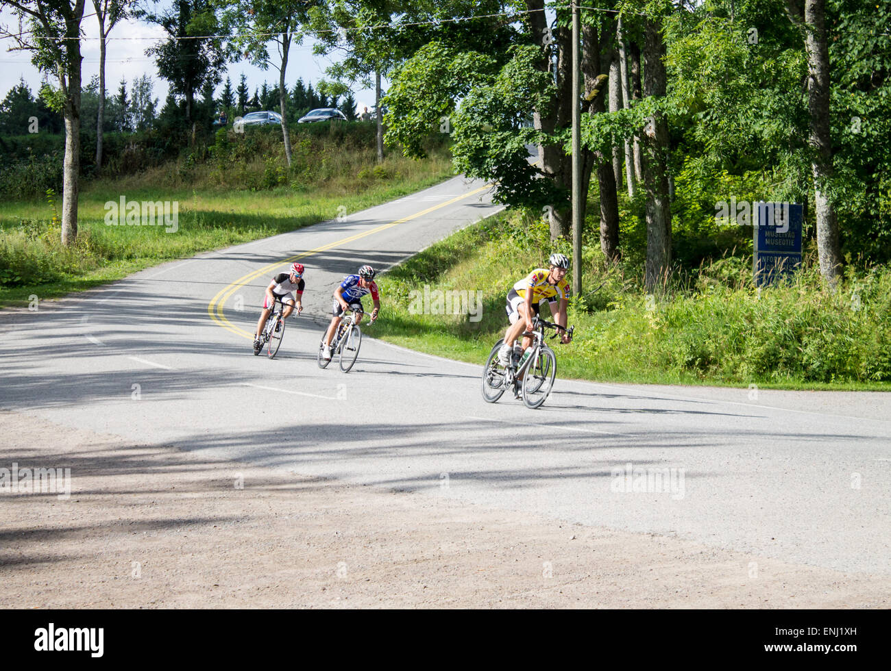 Bicyclers cycling in Inkoo, Finland. Stock Photo