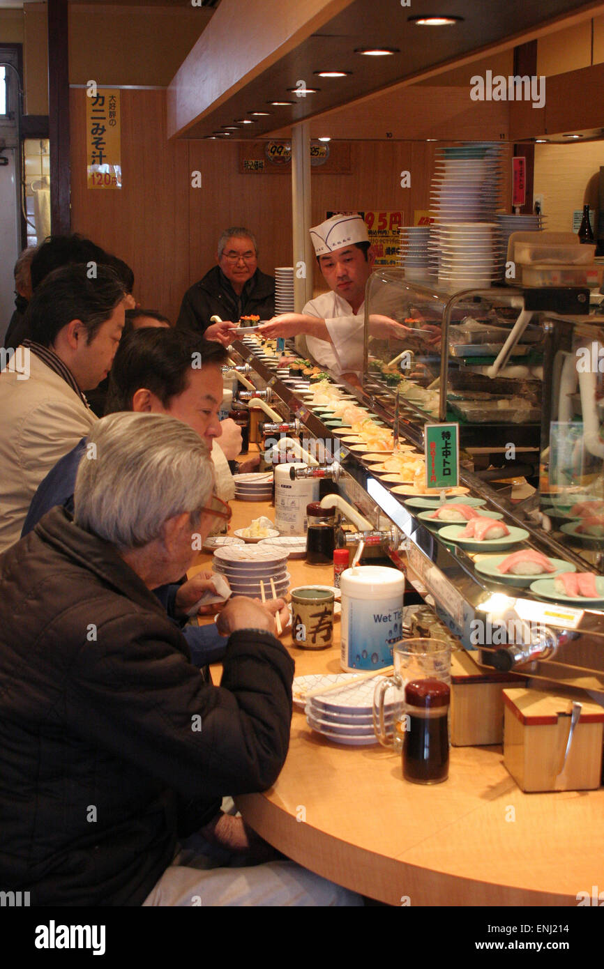 Revolving Sushi Bar in Tokyo Japan Stock Photo - Alamy