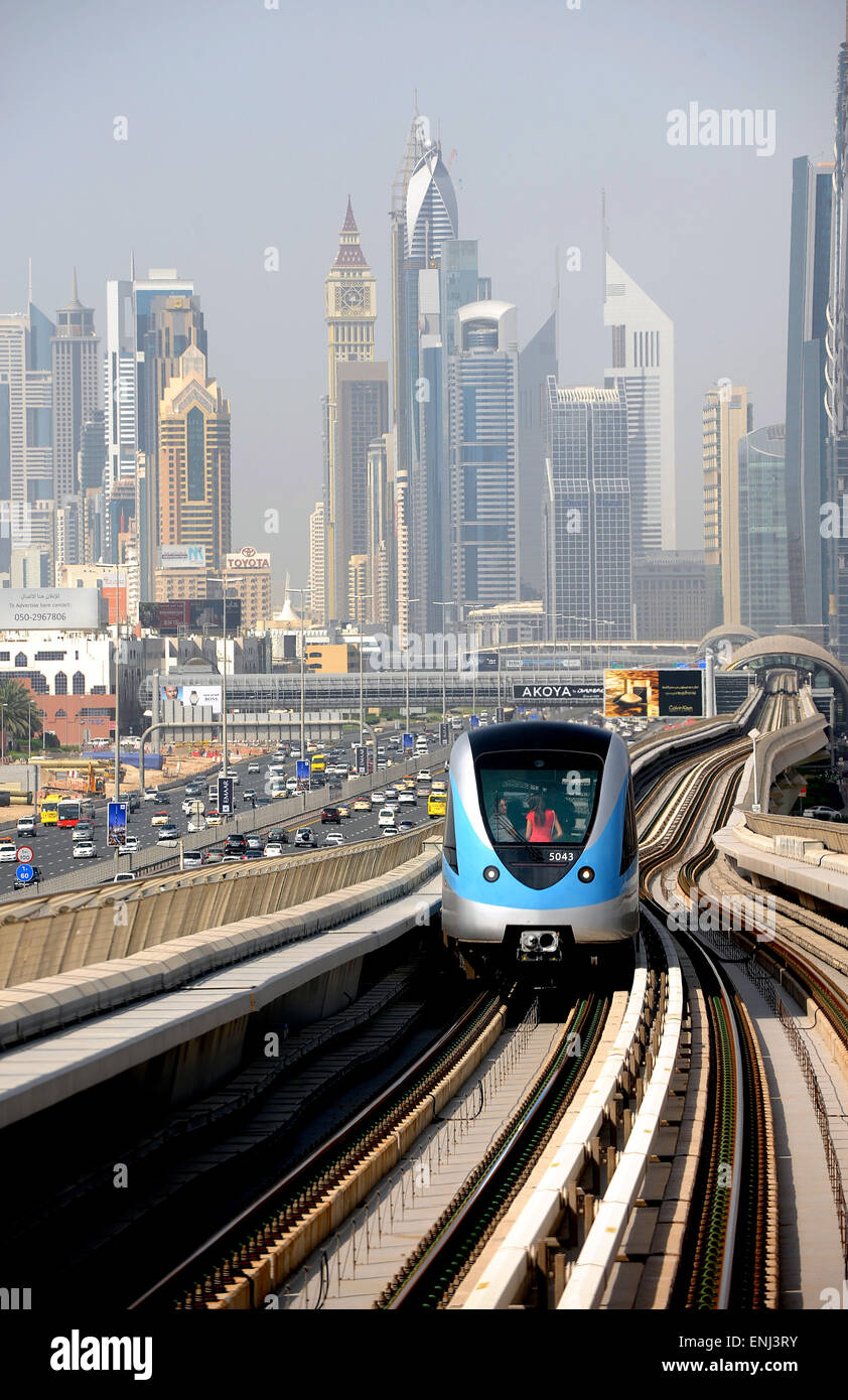 Dubai metro running along Sheikh Zayed Road in the United Arab Emirates Stock Photo