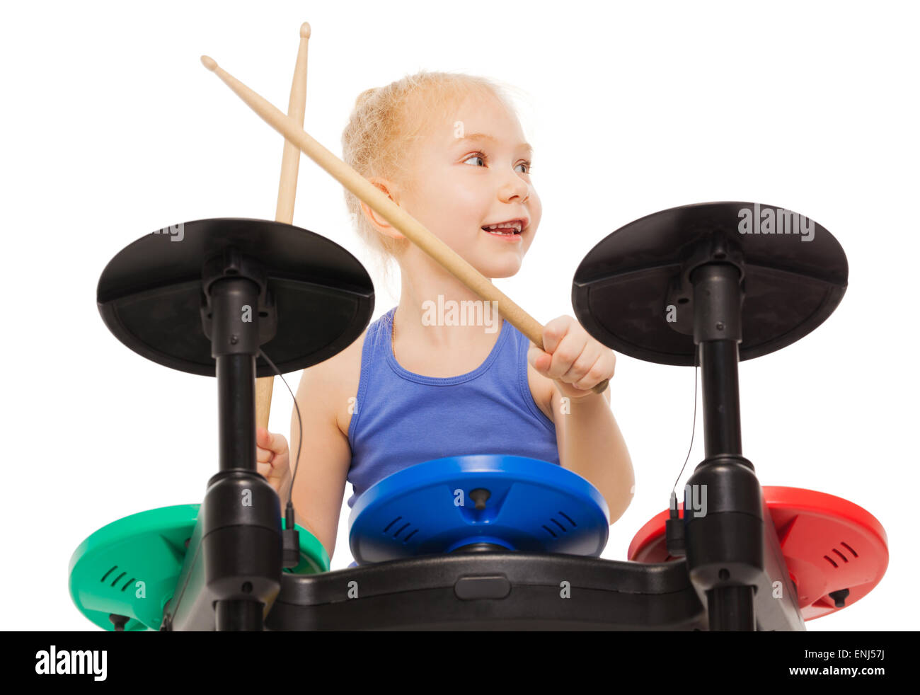 Close-up view of small girl playing on cymbals Stock Photo