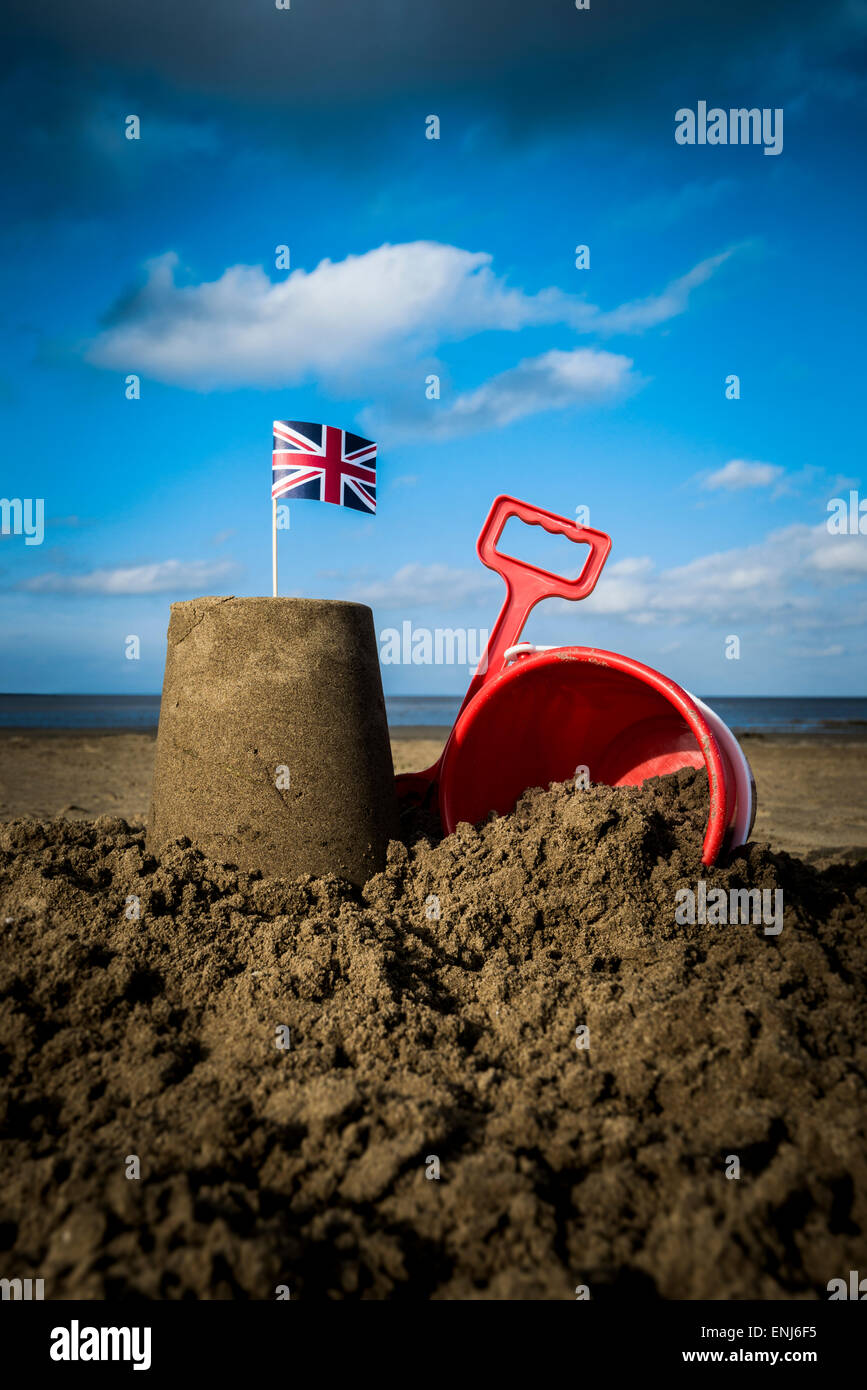 British sandcastle with bucket and spade Stock Photo