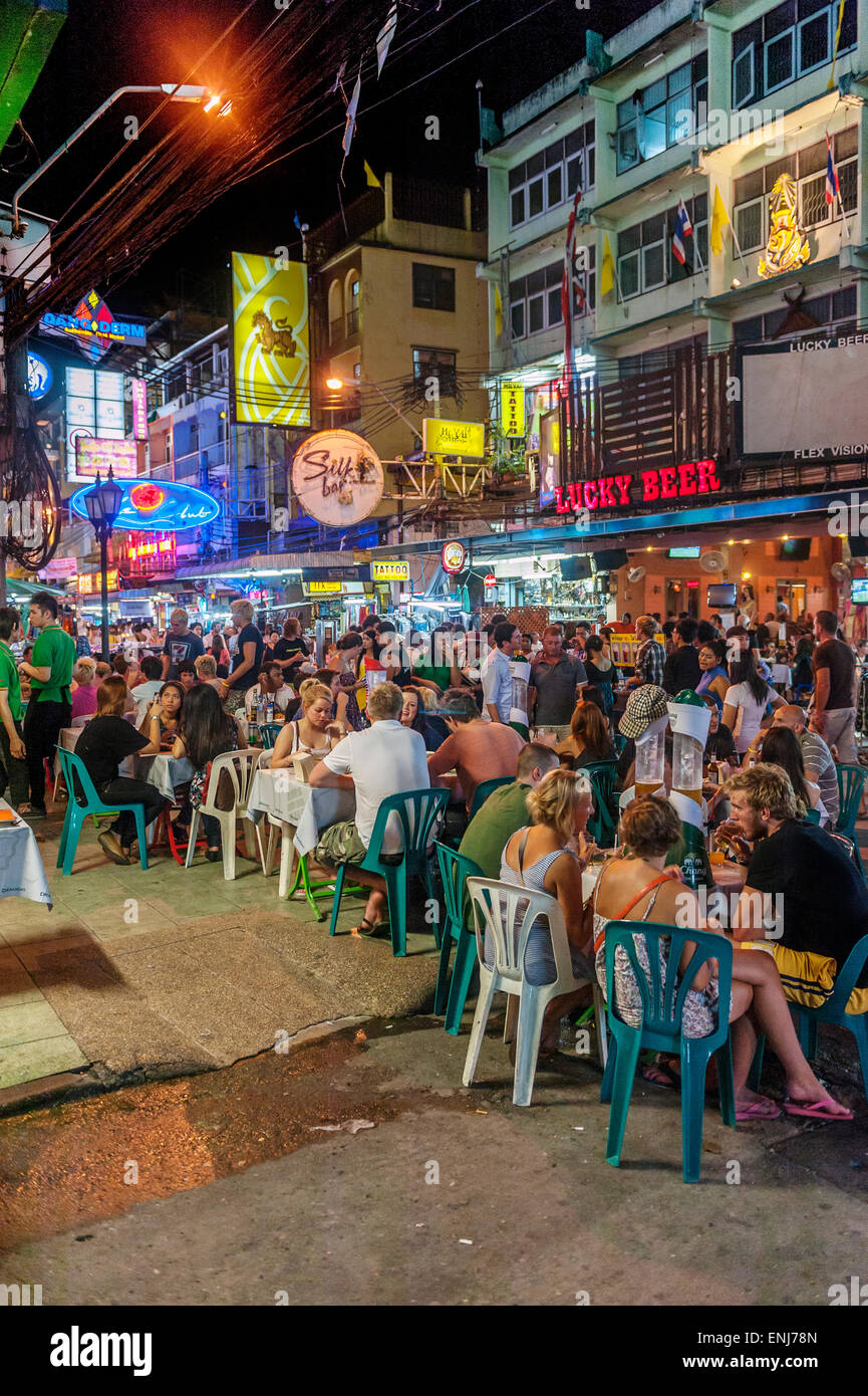 Street traders, locals and tourists mingle along the Khao San Road at night. Bangkok. Thailand. Stock Photo