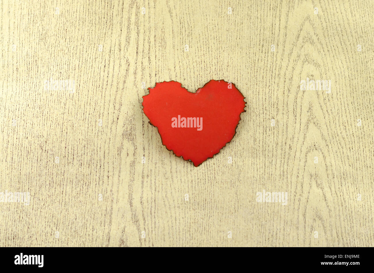 red heart on wood background Stock Photo - Alamy