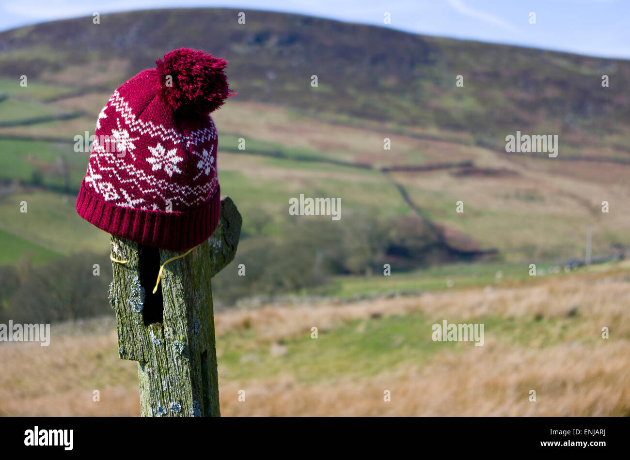 woolly hat with peak