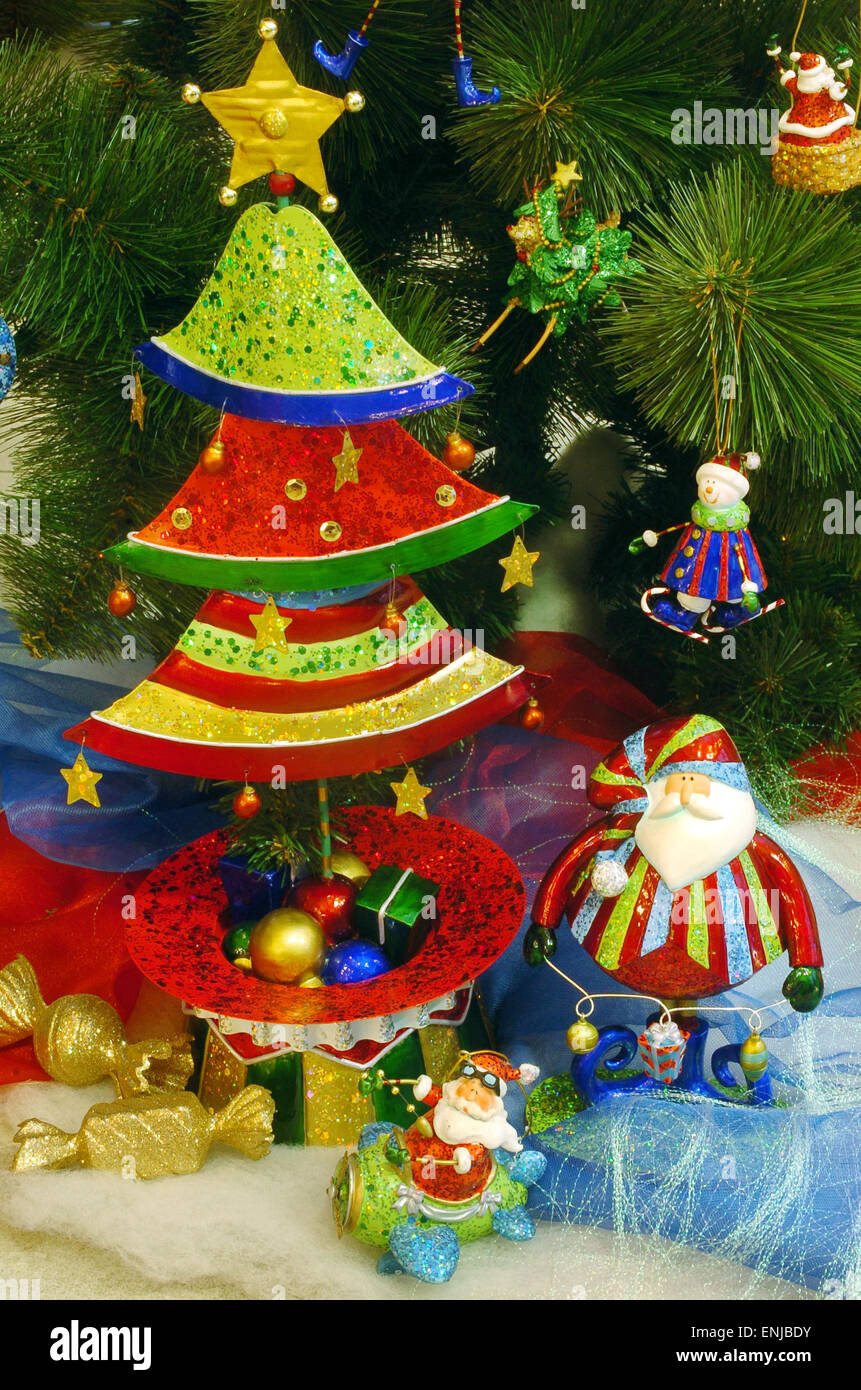 Fragment dressed up Christmas tree with toys. Background. Stock Photo