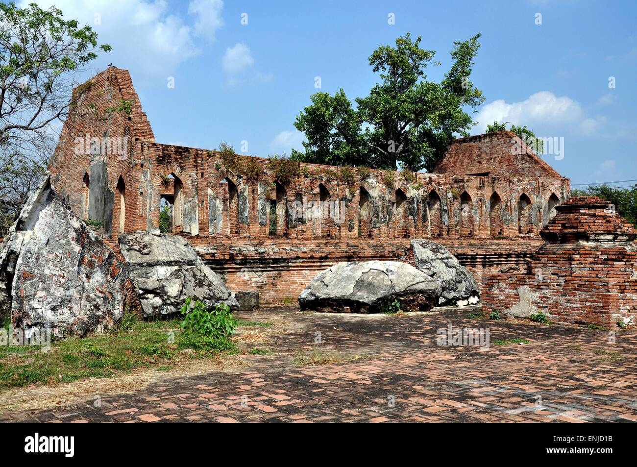 Ayutthaya, Thailand:  Romantic ruins of the brick Vihara with its row of arched windows at Wat Gudidao Stock Photo