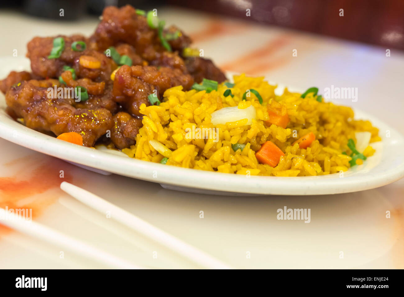 Hot and spicy General Tso's chicken served with a side of pork fried