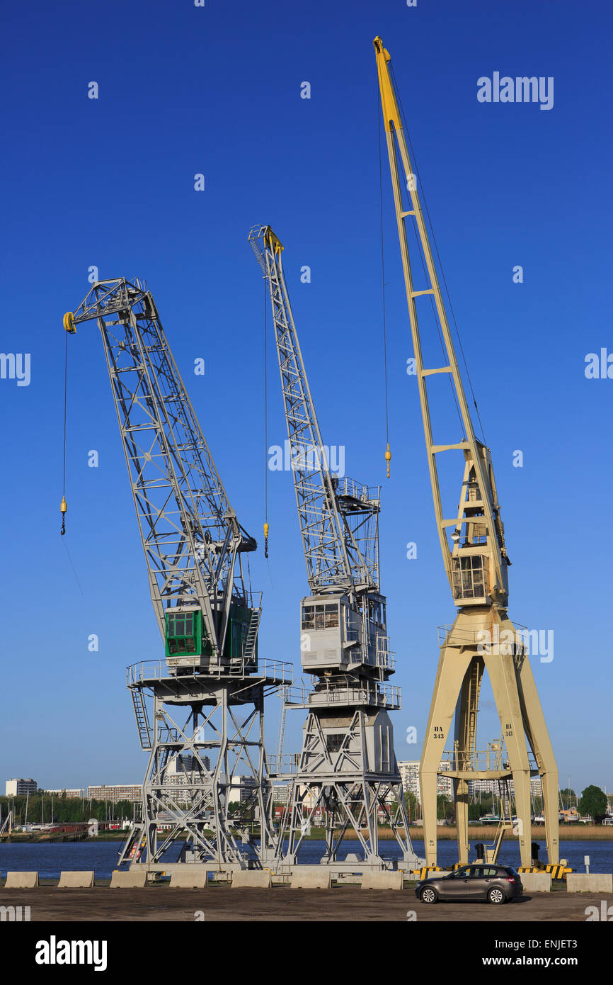 Three types of cranes at an open-air museum that were used in the Port of Antwerp, Belgium Stock Photo