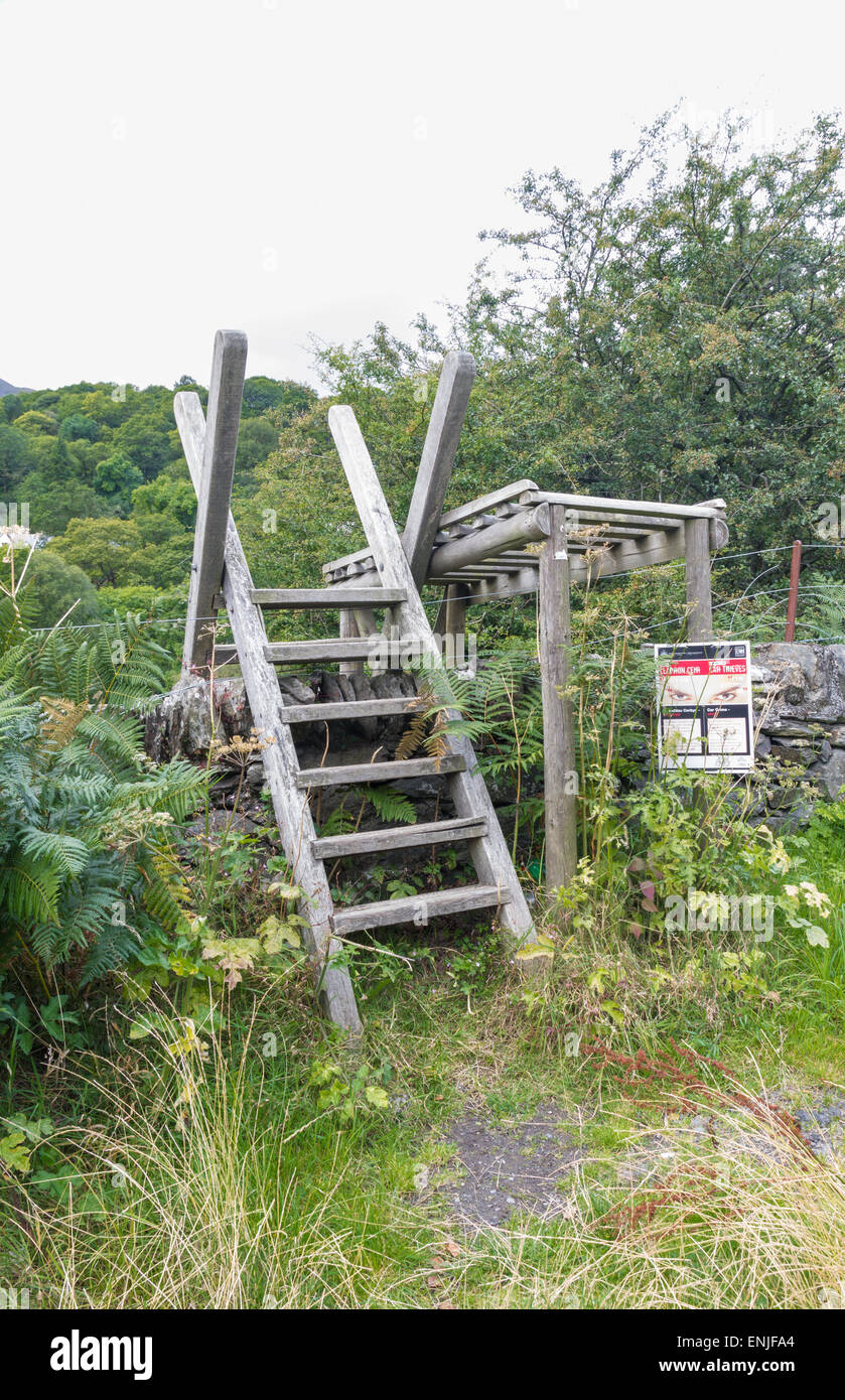 Ladder over fence hires stock photography and images Alamy