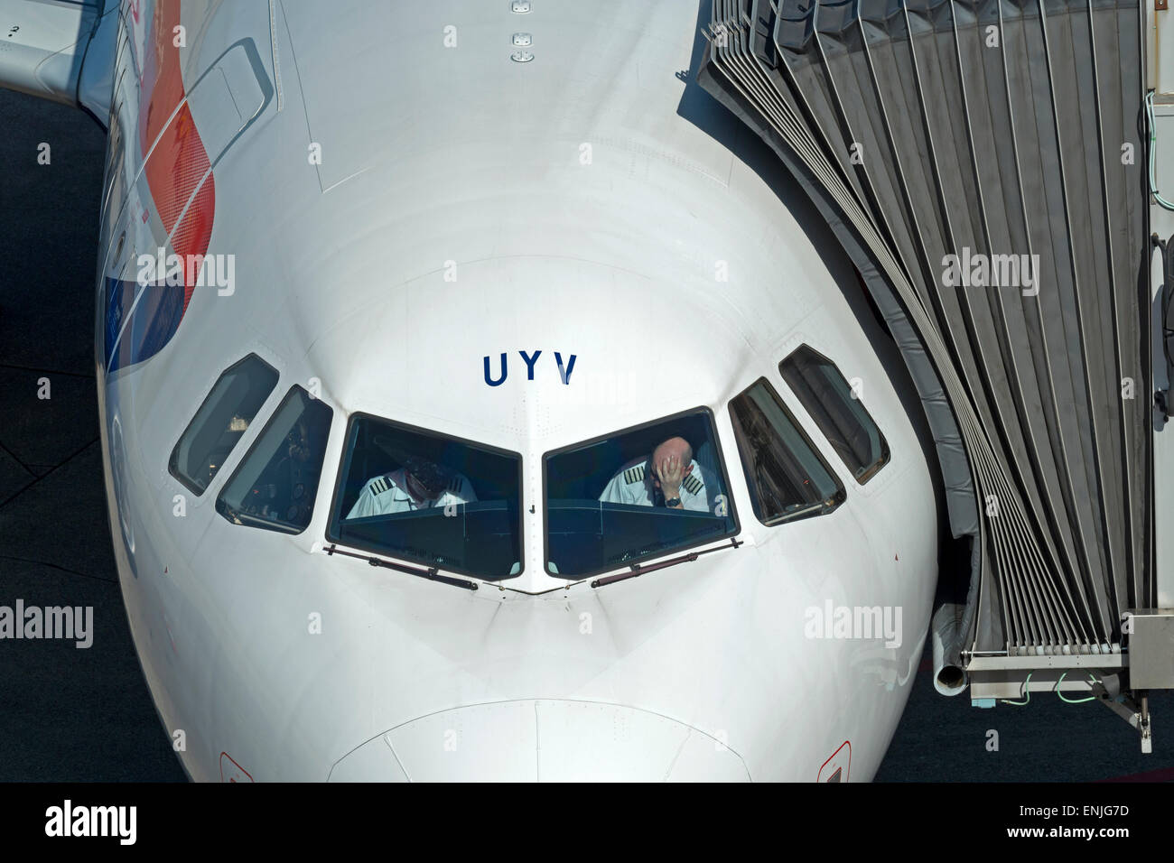 Pilots at the flight deck of a British Airways Airbus A320 airliner