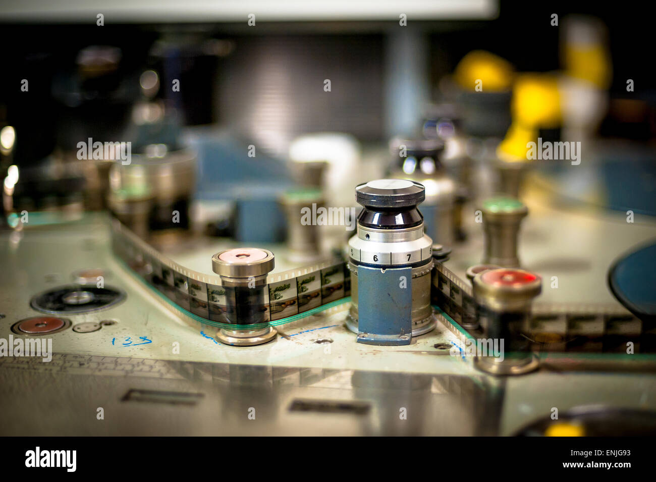 Editing machine for 35 mm movie detail, spool and film selective focus vintage color effect Stock Photo