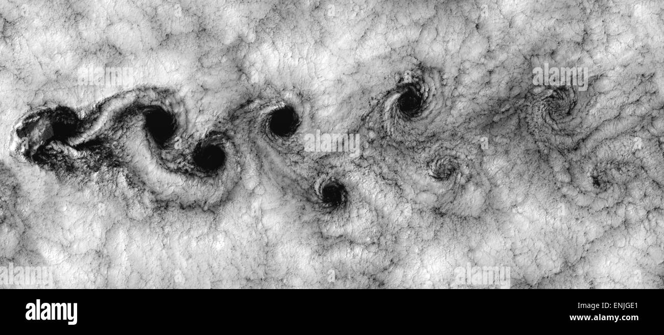 This Landsat 7 image of clouds off the Chilean coast near the Juan Fernandez Islands (also known as the Robinson Crusoe Islands) on September 15, 1999, shows a unique pattern called a 'von Kármán vortex street.' Stock Photo