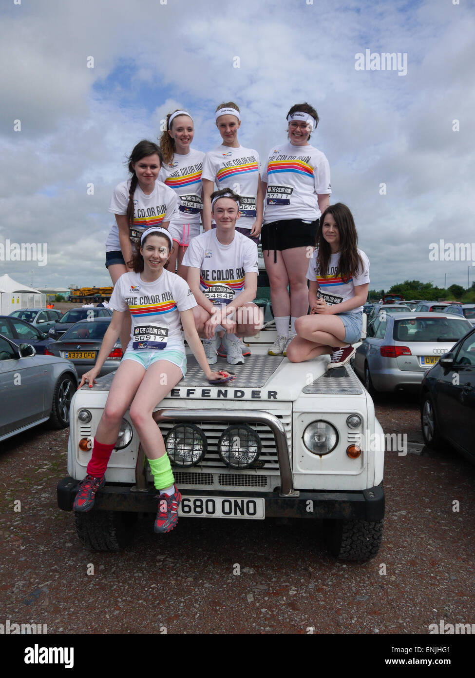 Fun runners sitting on a Land Rover before taking part in the Dulux ...