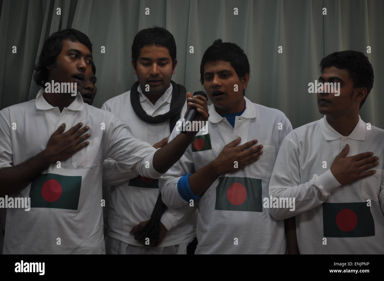 Naha, Okinawa, Japan: choir of Bangladeshi students singing at a Japanese school Stock Photo