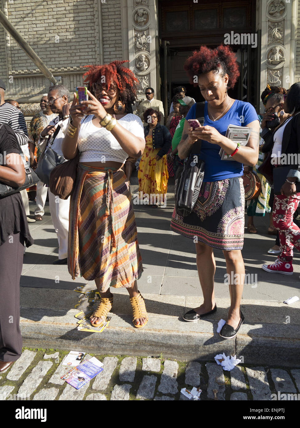 Friends wearing African inspired clothing and jewelry at The Dance