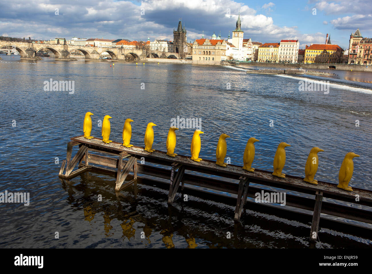 Yellow penguins, Work of Cracking Art Group, Prague Kampa museum Czech Republic Vltava River Stock Photo