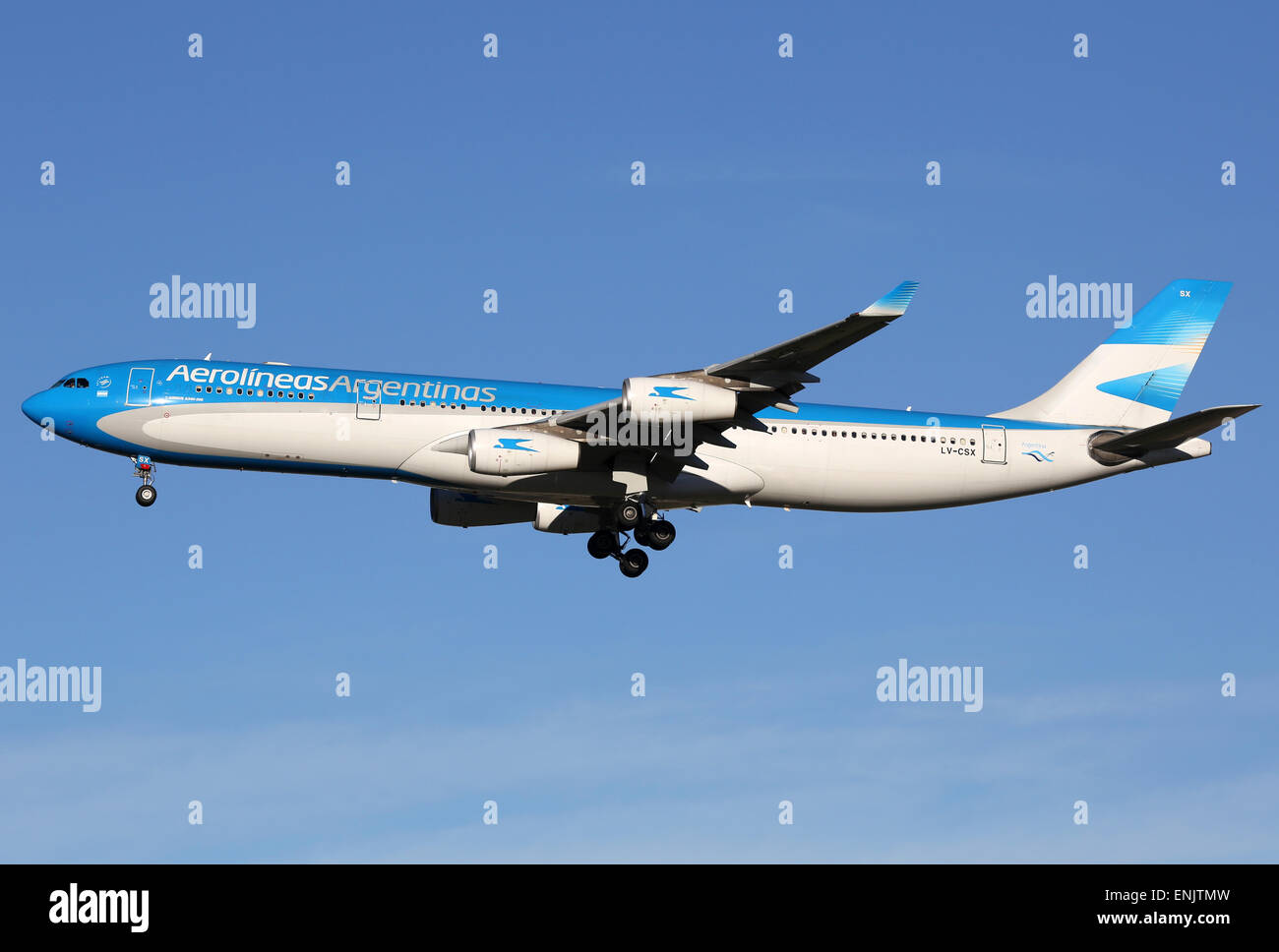 Madrid, Spain - March 5, 2015: An Aerolineas Argentinas Airbus A340 with the registration LV-CSX landing at Madrid Airport (MAD) Stock Photo