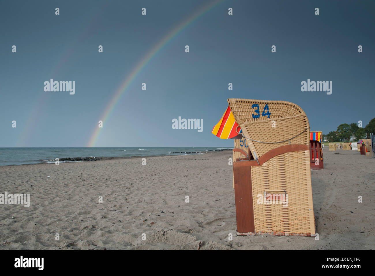 Germany, Niendorf, beach, beach chair in the rainbow Stock Photo