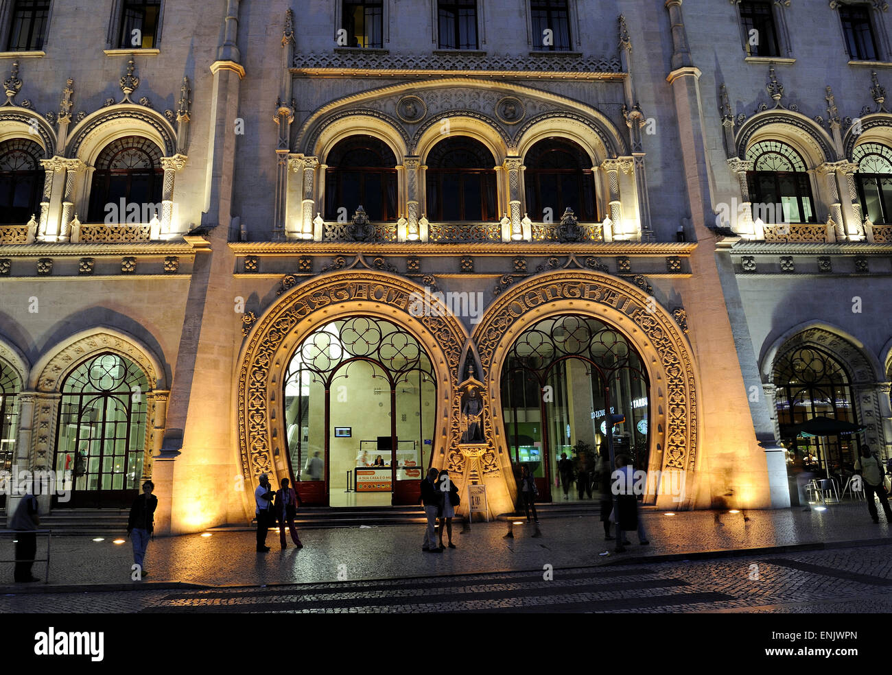 Entrance to the train station at Rossio with night-lighting, Praça de D. Pedro IV, Lisbon, Grande Lisboa, Portugal Stock Photo