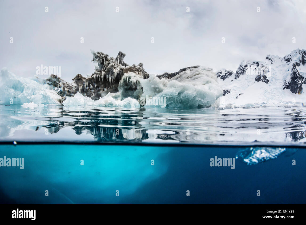 Above and below water view of iceberg at Booth Island, Antarctica, Polar Regions Stock Photo