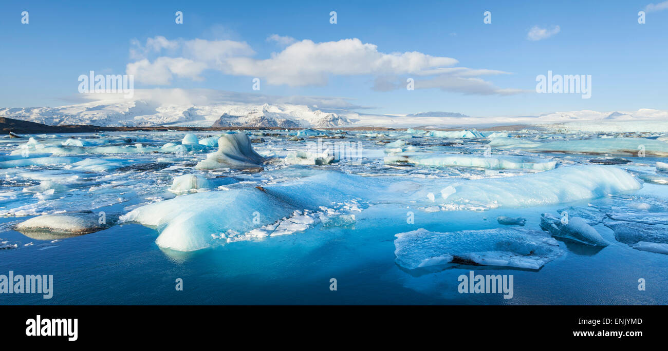 Panorama of mountains and icebergs locked in the frozen water, Jokulsarlon Iceberg Lagoon, Jokulsarlon, Iceland Stock Photo