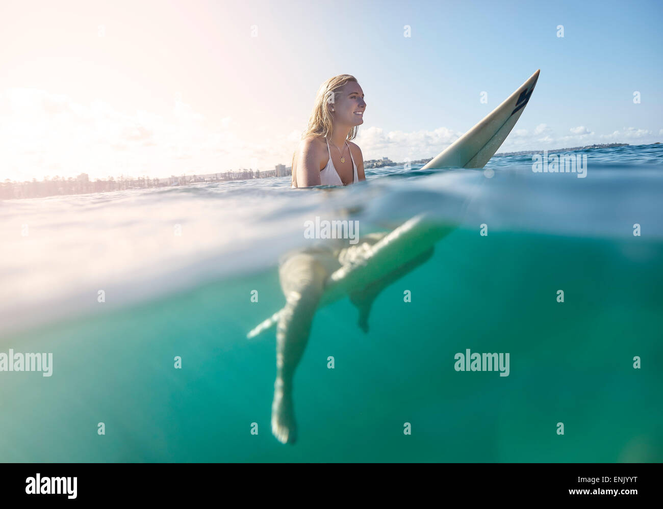 Girl on surfboard, New South Wales, Australia, Pacific Stock Photo
