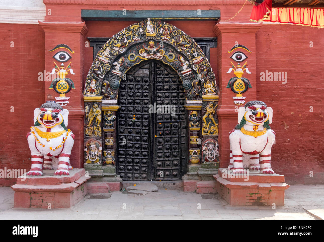 Lion statues outside a gate at the Taleju Temple, Durbar Square, Kathmandu, Nepal, Asia Stock Photo