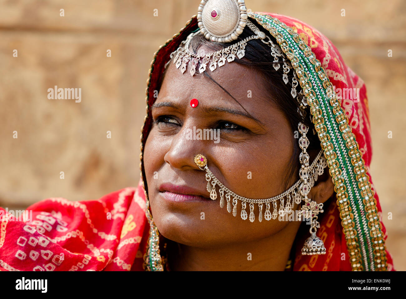 Unidentified Indian woman dressed her traditional scarfs with very nice ornaments and piercings in Jaisalmer,india. Stock Photo