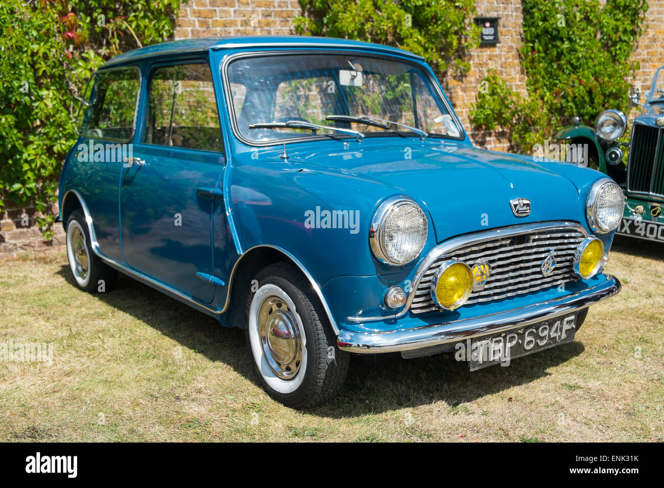 WINDSOR, BERKSHIRE, UK- AUGUST 3, 2014: A Blue Classic Austin Mini on show at a Classic Car Show in August 2013. Stock Photo