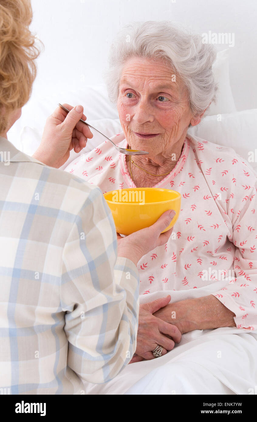 Spoon feeding elderly hires stock photography and images Alamy