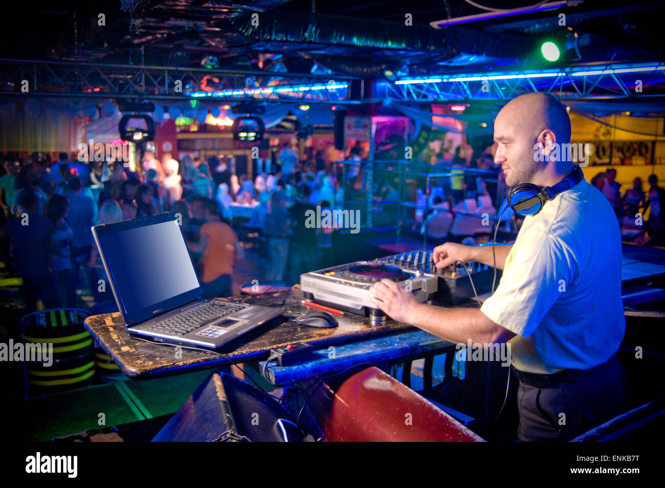 DJ behind the control panel vinyl records Stock Photo - Alamy