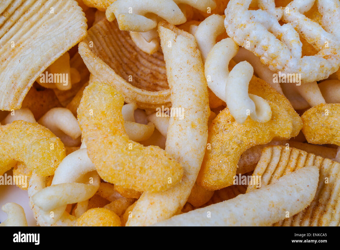 pile with a various of salty snacks Stock Photo - Alamy