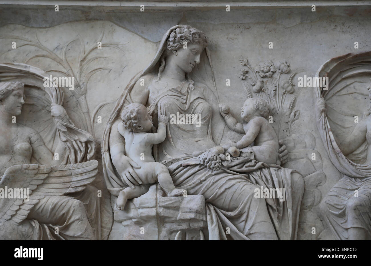 Italy. Rome. Ara Pacis Augustae. A goddess Tellus (Earth) sits amid a scene of fertility and prosperity with twins. Stock Photo
