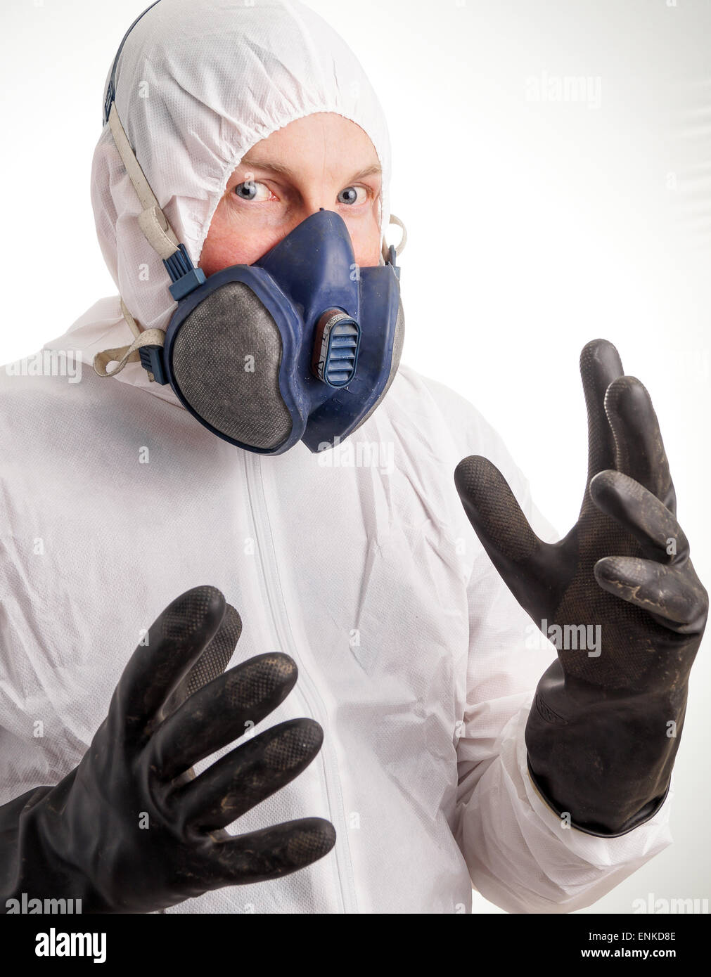 Man in protective suit, gloves and a respiraton Stock Photo