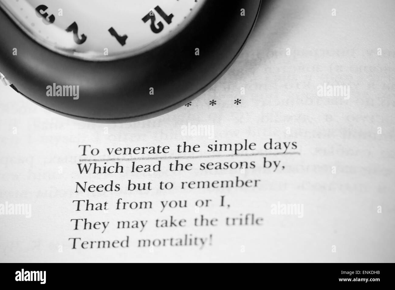 Poetry book and clock life temporality concept Stock Photo Alamy