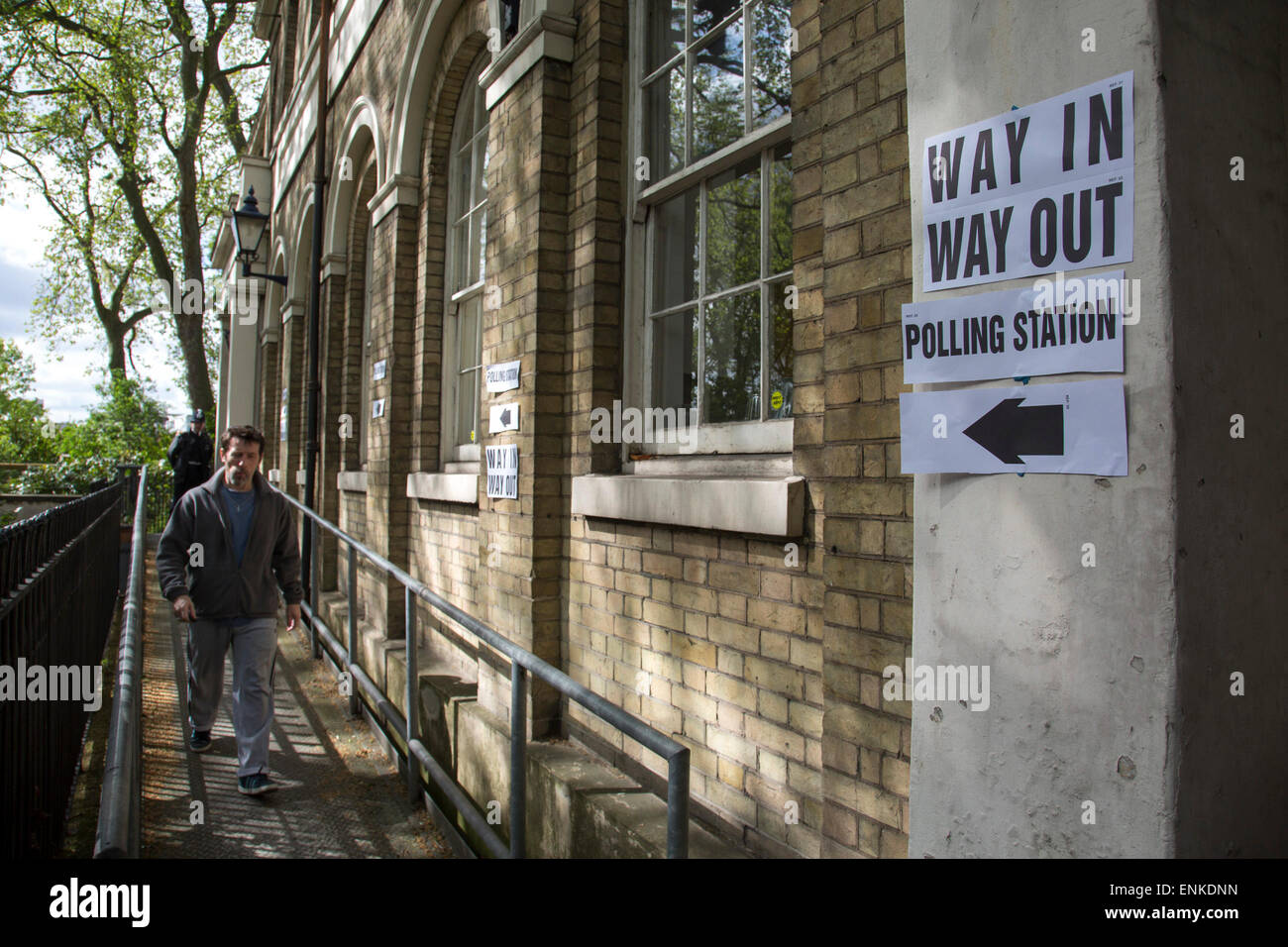 London, UK. Thursday 7th May 2015. Voters attending a polling station at St Pauls Institute in the constituency of  Poplar and Limehouse in East London on the day of the general election. This is a Labour Party seat, although this electin is set to be one of the most hotly contested in a generation. Stock Photo