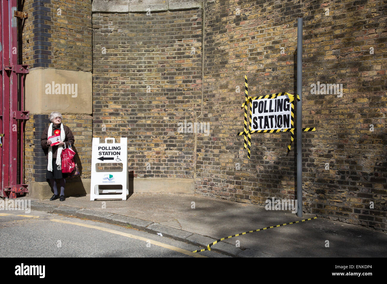 London, UK. Thursday 7th May 2015. Voters attending a polling station at John Orwell Leisure Centre in the constituency of  Poplar and Limehouse in East London on the day of the general election. This is a Labour Party seat, although this electin is set to be one of the most hotly contested in a generation. Stock Photo