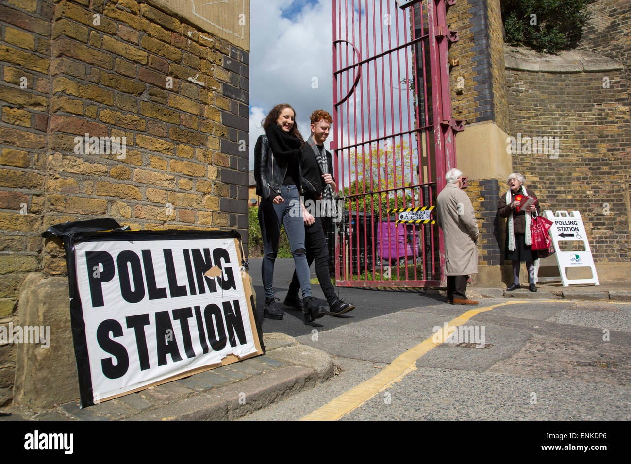 London, UK. Thursday 7th May 2015. Voters attending a polling station at John Orwell Leisure Centre in the constituency of  Poplar and Limehouse in East London on the day of the general election. This is a Labour Party seat, although this electin is set to be one of the most hotly contested in a generation. Stock Photo