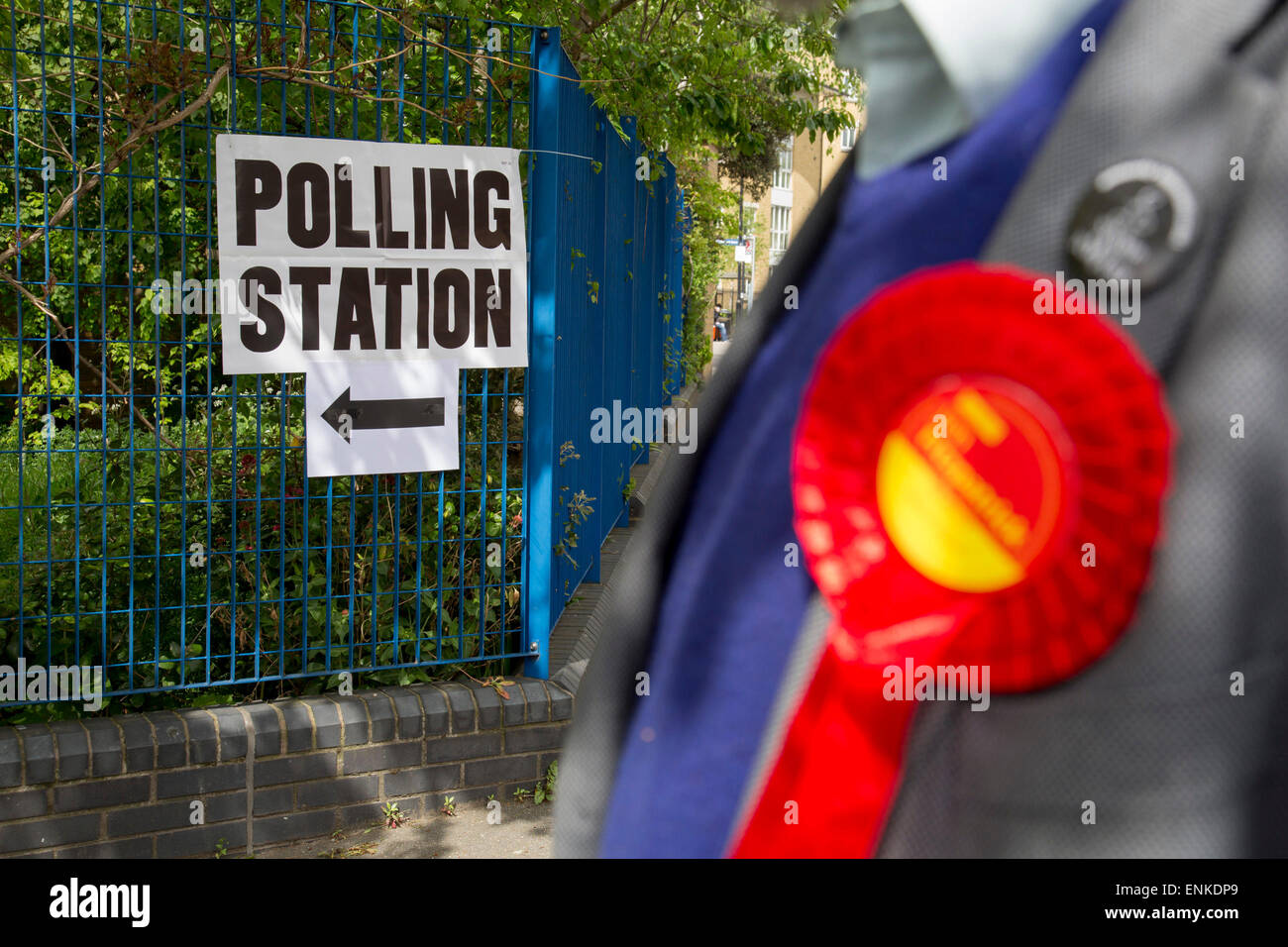 London, UK. Thursday 7th May 2015. Voters attending a polling station at Hermitage Primary School in the constituency of  Poplar and Limehouse in East London on the day of the general election. This is a Labour Party seat, although this electin is set to be one of the most hotly contested in a generation. Stock Photo