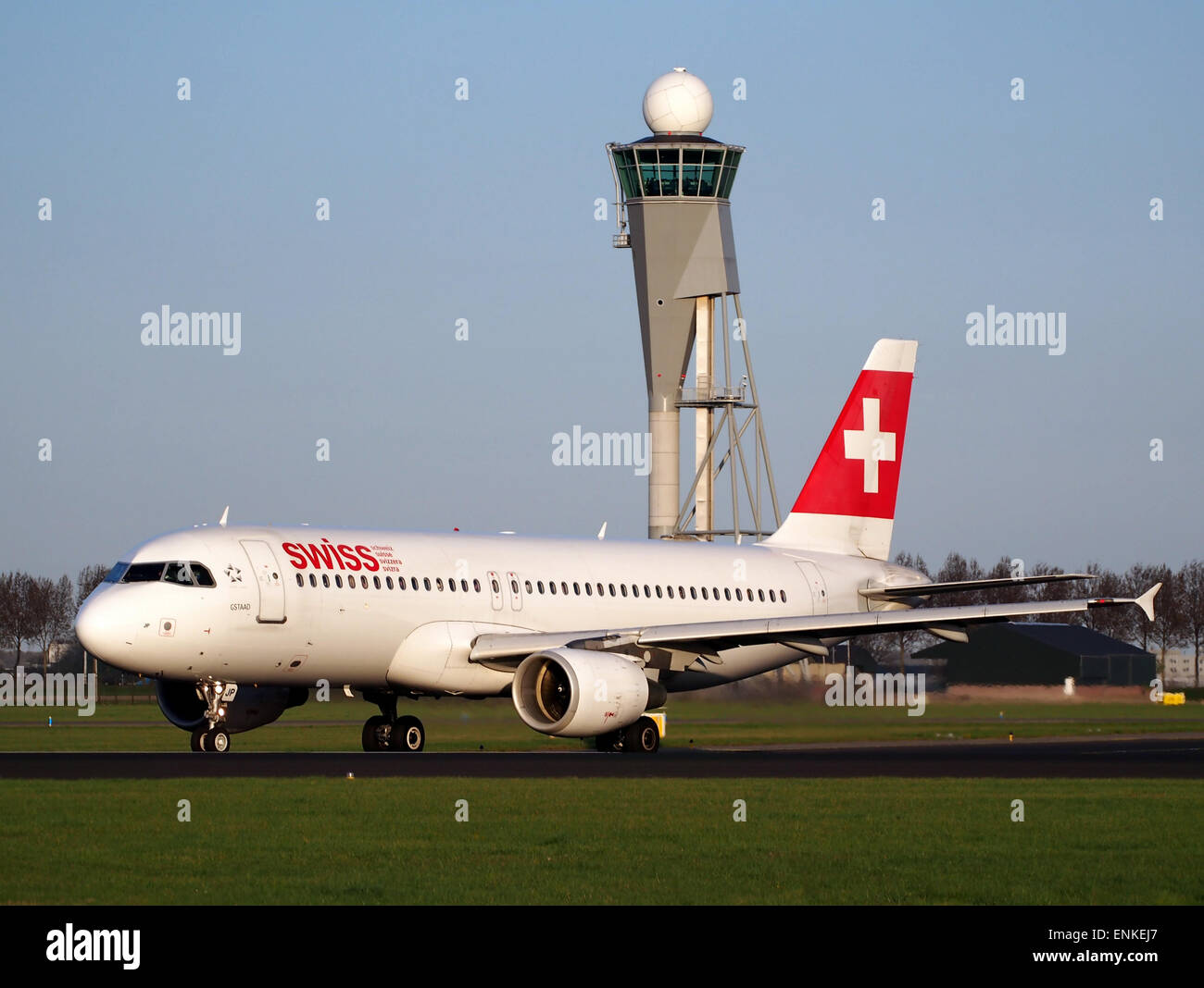 HB-IJP Swiss Airbus A320-214 - cn 681 takeoff from Polderbaan, Schiphol (AMS - EHAM) at sunset, Stock Photo