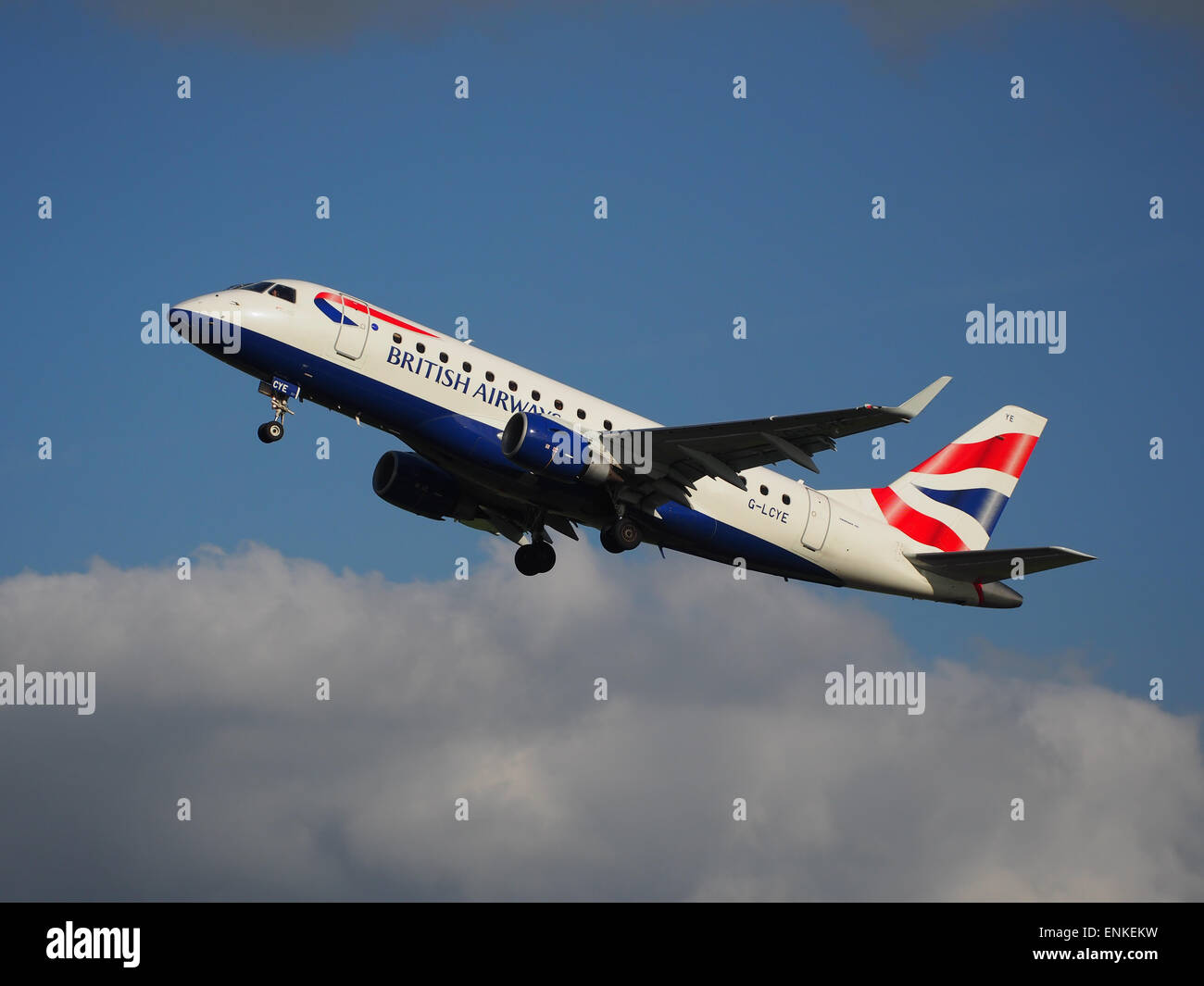 BA CityFlyer G-LCYE Embraer 170-175 takeoff from Polderbaan, Schiphol (AMS - EHAM) at sunset, pic Stock Photo