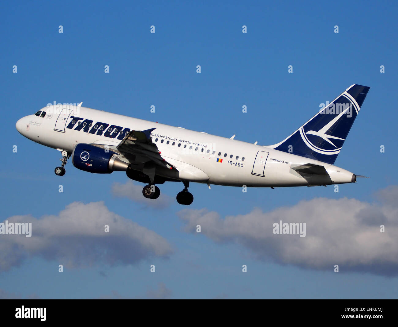 YR-ASC TAROM Airbus A318-111 takeoff from Polderbaan, Schiphol (AMS - EHAM) at sunset, Stock Photo