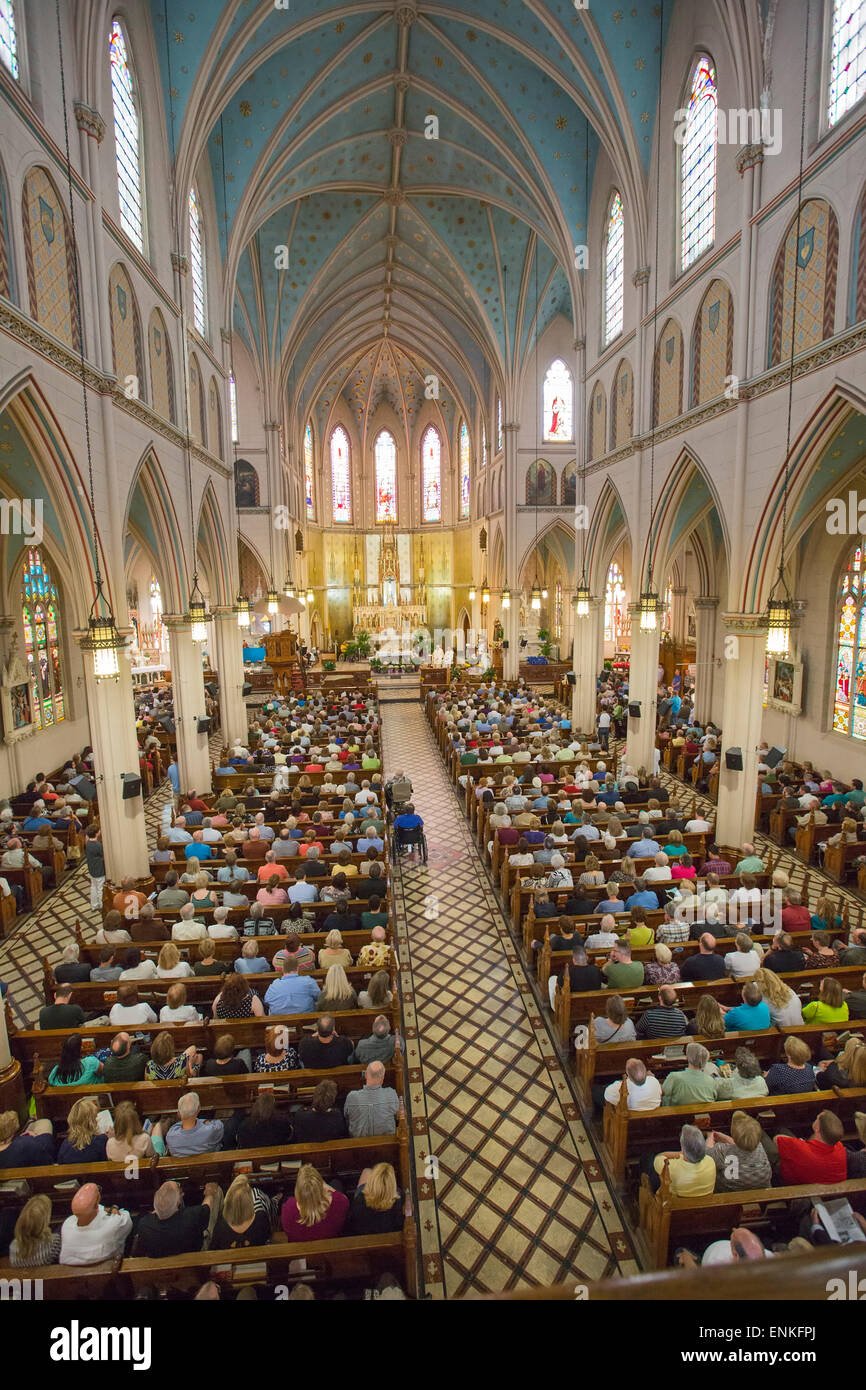 Detroit, Michigan - A 'mass mob' fills Ste. Anne de Detroit Catholic Church for Sunday morning mass. Stock Photo