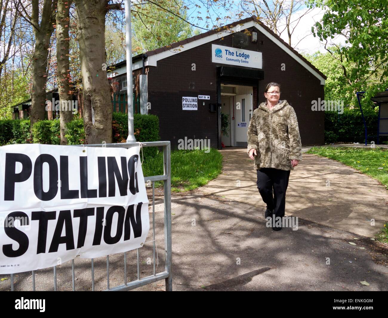 Runcorn, Cheshire, England, UK. 7th May 2015. Voter leaving local polling station. Credit:  Dave Baxter/Alamy Live News Stock Photo