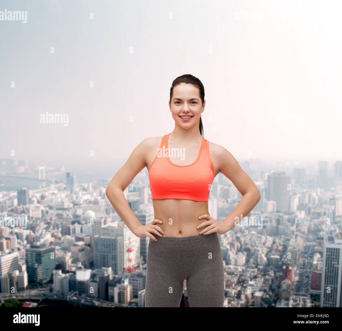 smiling teenage girl in sportswear Stock Photo