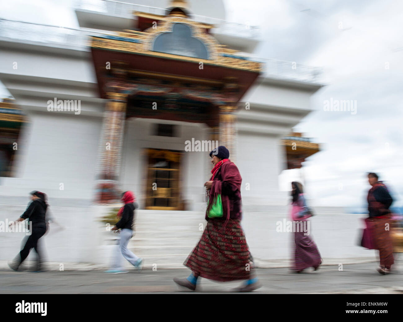 Devotees walking around King Jigme Dorji Wangchuck memorial Thimpu Bhutan Stock Photo